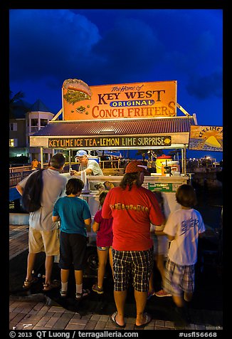 Key lime and conch fritters food stand at night. Key West, Florida, USA