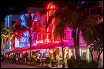 Art Deco hotels and restaurants with facades lit in bright colors, Miami Beach. Florida, USA ( color)