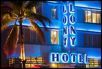 Palm tree and neon light on hotel facade, Miami Beach. Florida, USA ( color)