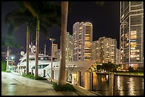 Large yacht, Miami River, and Brickell Key at night, Miami. Florida, USA ( color)