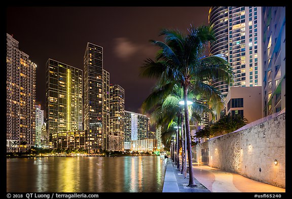 Miami Riverwalk and Miami River at night, Miami. Florida, USA