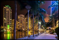 Miami Riverwalk and Miami River, Brickell district, night, Miami. Florida, USA ( color)