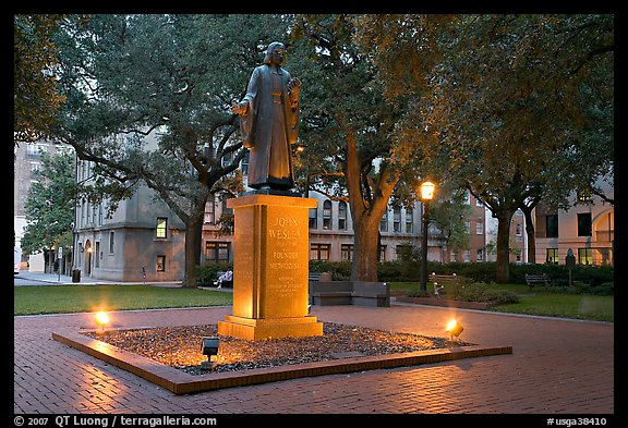 Square with statue of John Wesley at dusk. Savannah, Georgia, USA (color)