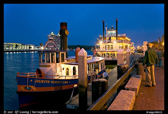 Ferry and riverboat on Savannah River at dusk. Savannah, Georgia, USA (color)
