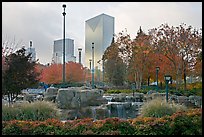 Fall colors and cascades in Centenial Olympic Park with skyline. Atlanta, Georgia, USA