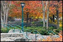 Railings, lamp, and trees in autumn colors, Centenial Olympic Park. Atlanta, Georgia, USA ( color)