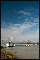 Mississippi River, paddle riverboat, and bridge. Natchez, Mississippi, USA (color)