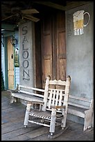 Rocking chair on saloon porch, Natchez under-the-hill. Natchez, Mississippi, USA (color)