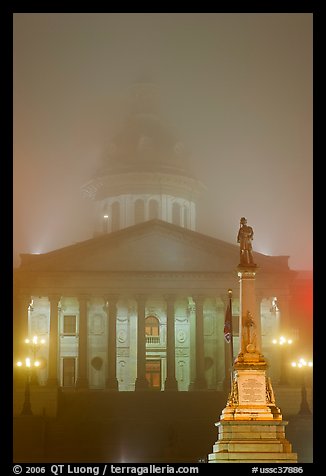 Monument and state capitol in fog at night. Columbia, South Carolina, USA