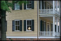 House with lamp inside window. Columbia, South Carolina, USA