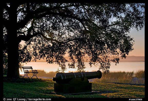 Cannon, and bench overlooking Beaufort Bay at sunrise. Beaufort, South Carolina, USA (color)