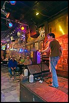 Singer performing in a music club. Nashville, Tennessee, USA