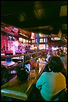 Patrons listen to musical performance in Beale Street bar. Memphis, Tennessee, USA ( color)