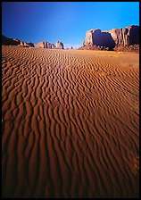 Ripples on sand dunes and mesas, late afternoon. Monument Valley Tribal Park, Navajo Nation, Arizona and Utah, USA (color)