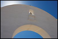 Backlit whitewashed arch, San Xavier del Bac Mission. Tucson, Arizona, USA