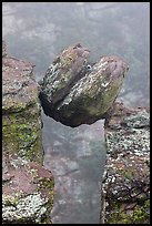 Spherical boulder stuck between pillars. Chiricahua National Monument, Arizona, USA