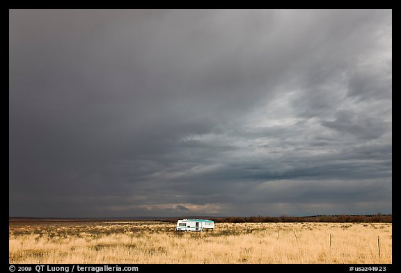 Trailer and storm sky. Arizona, USA