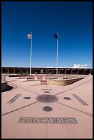 Disks, seals, and flags. Four Corners Monument, Arizona, USA ( color)