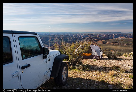 Jeep and tent on Canyon Rim, Twin Point. Grand Canyon-Parashant National Monument, Arizona, USA (color)