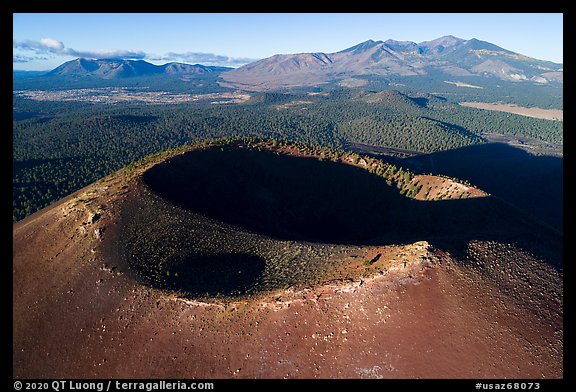 Aerial View of Sunset Crater with Humphreys Peak, San Francisco Mountains. Sunset Crater Volcano National Monument, Arizona, USA