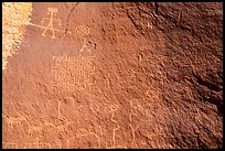 Petroglyph panel with anthropomorphic, zoomorphic, and abstract designs. Vermilion Cliffs National Monument, Arizona, USA ( color)