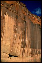 White House Ancestral Pueblan ruins and wall with desert varnish and corner of sky. Canyon de Chelly  National Monument, Arizona, USA ( color)