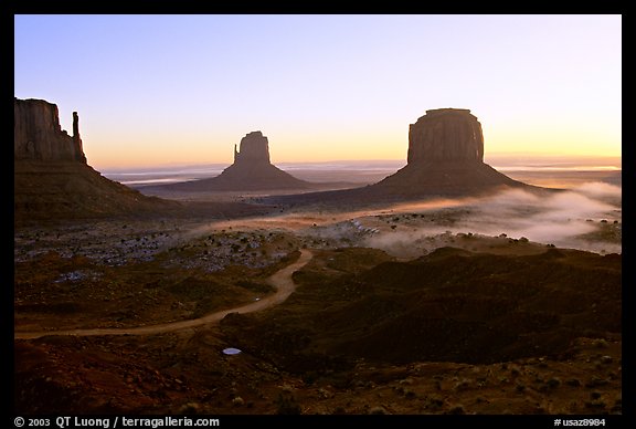 Mittens and fog, sunrise. Monument Valley Tribal Park, Navajo Nation, Arizona and Utah, USA (color)