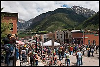 Crowds gather on main street during ice-cream social. Telluride, Colorado, USA ( color)