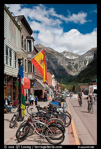 Mountain bikes parked on main street sidewalk. Telluride, Colorado, USA (color)