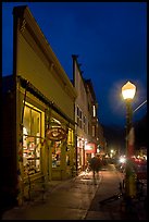 Coffee shop and sidewalk by night. Telluride, Colorado, USA