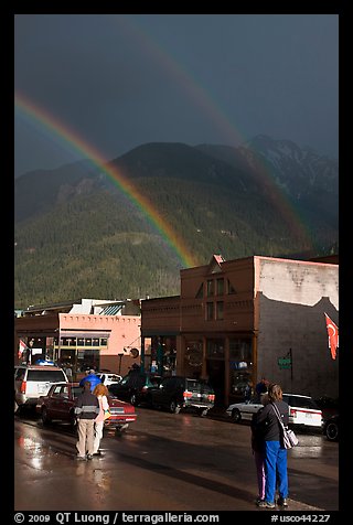 People watching double rainbow on main street. Telluride, Colorado, USA (color)