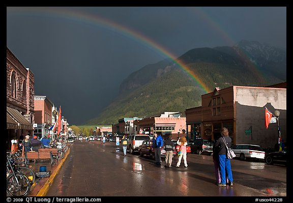 Double rainbow and dark sky over main street. Telluride, Colorado, USA