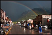 Double rainbow and dark sky over main street. Telluride, Colorado, USA ( color)