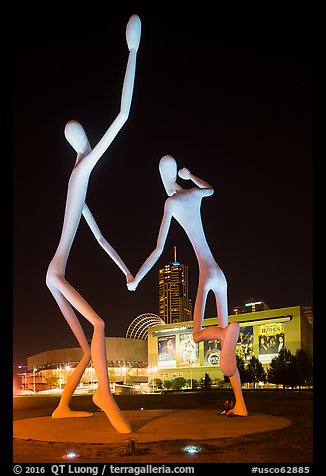 Sculpture framing Center for Performing Arts at night. Denver, Colorado, USA (color)