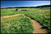 Trail and historic barns,  Florissant Fossil Beds National Monument. Colorado, USA ( color)