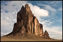 Shiprock with top embraced by cloud. Shiprock, New Mexico, USA ( color)