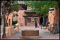 Pedestrian alley with woman and child. Taos, New Mexico, USA ( color)