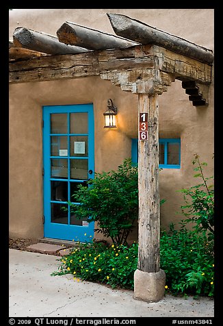 Blue door and window at house entrance. Taos, New Mexico, USA (color)