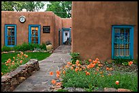 Front yard and pueblo style houses. Taos, New Mexico, USA