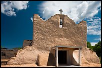 Facade of church covered with tightly compacted earth, clay, and straw, Picuris Pueblo. New Mexico, USA