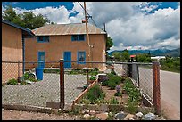House with blue windows, Truchas. New Mexico, USA