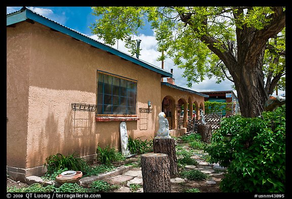 Gallery with sculptures in front yard, Truchas. New Mexico, USA (color)