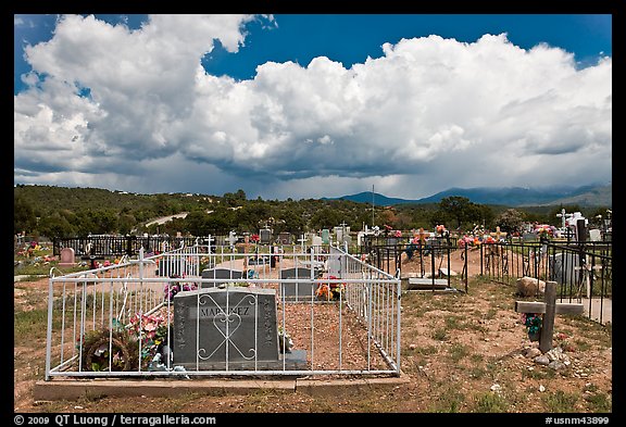 Cemetery and clouds, Truchas. New Mexico, USA