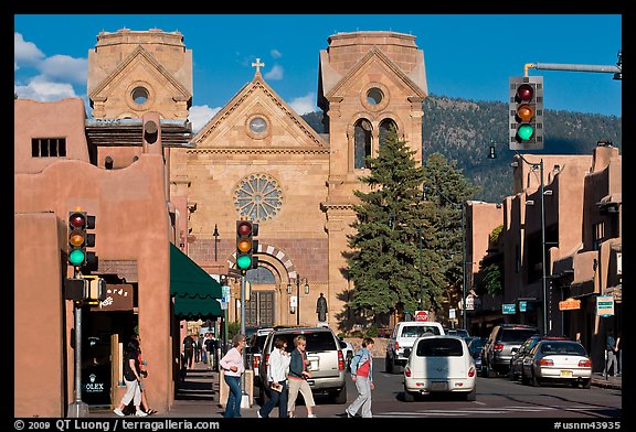 Pedestrians and street with cathedral, downtown. Santa Fe, New Mexico, USA (color)