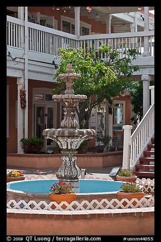 Fountain and white guardrails, old town. Albuquerque, New Mexico, USA (color)