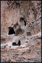 Natureal cavities and architectural carvings in tuff wall. Bandelier National Monument, New Mexico, USA ( color)
