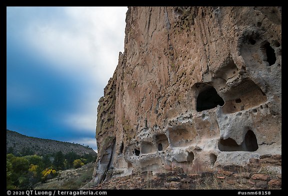 Tuff cliff with cave dwellings, Frijoles Canyon. Bandelier National Monument, New Mexico, USA