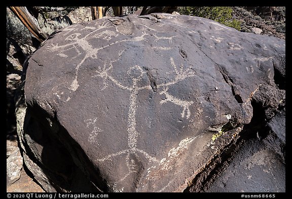 Large human figure petroglyphs on top of bouder, Big Arsenic. Rio Grande Del Norte National Monument, New Mexico, USA (color)
