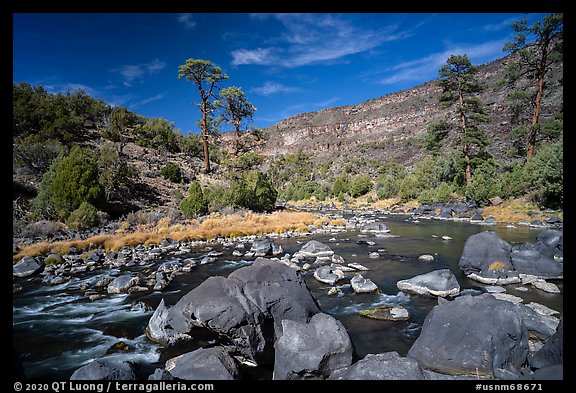 Rio Grande flowing between boulders near Big Arsenic Spring. Rio Grande Del Norte National Monument, New Mexico, USA