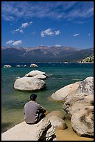 Man sitting on boulder, Sand Harbor, Lake Tahoe-Nevada State Park, Nevada. USA ( color)